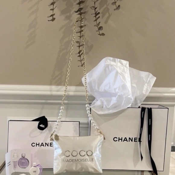 CHANEL Handbags - CHANEL Cream Coco Mademoiselle cosmetics Bag